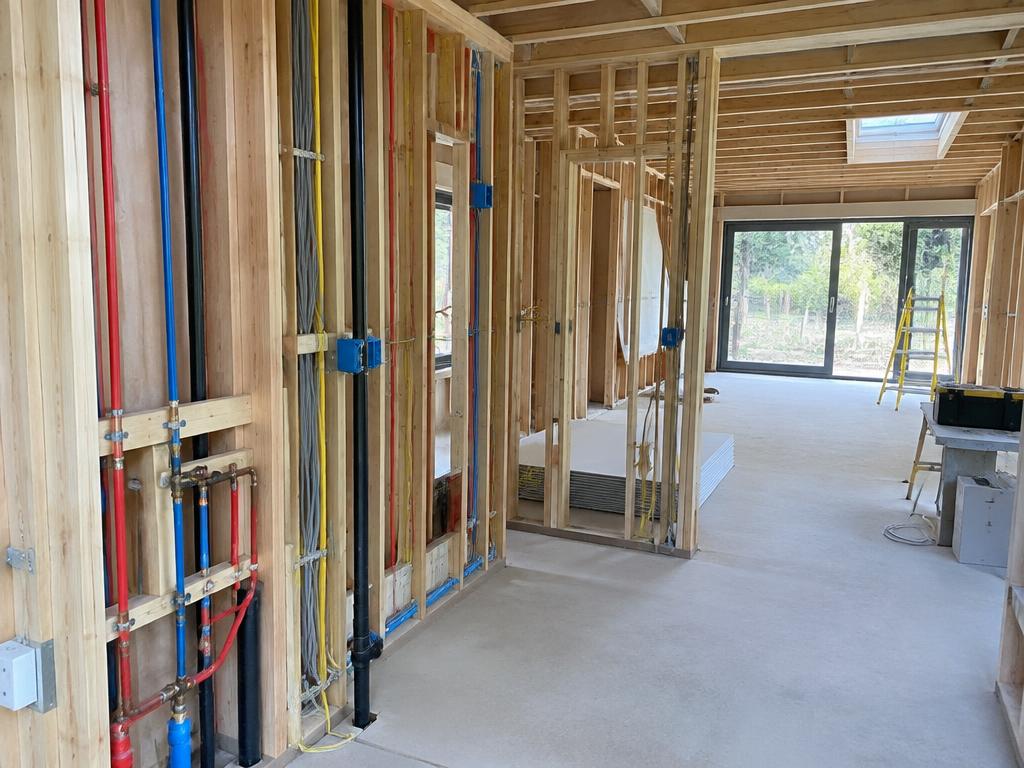 First-fix plumbing and electrics in a new extension